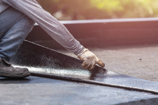 Professional Basement Waterproofing technician working in Florence, AL
